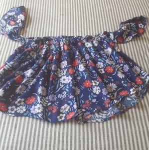 Elodie Bandu Ruffle top with off the shoulder sleeves.